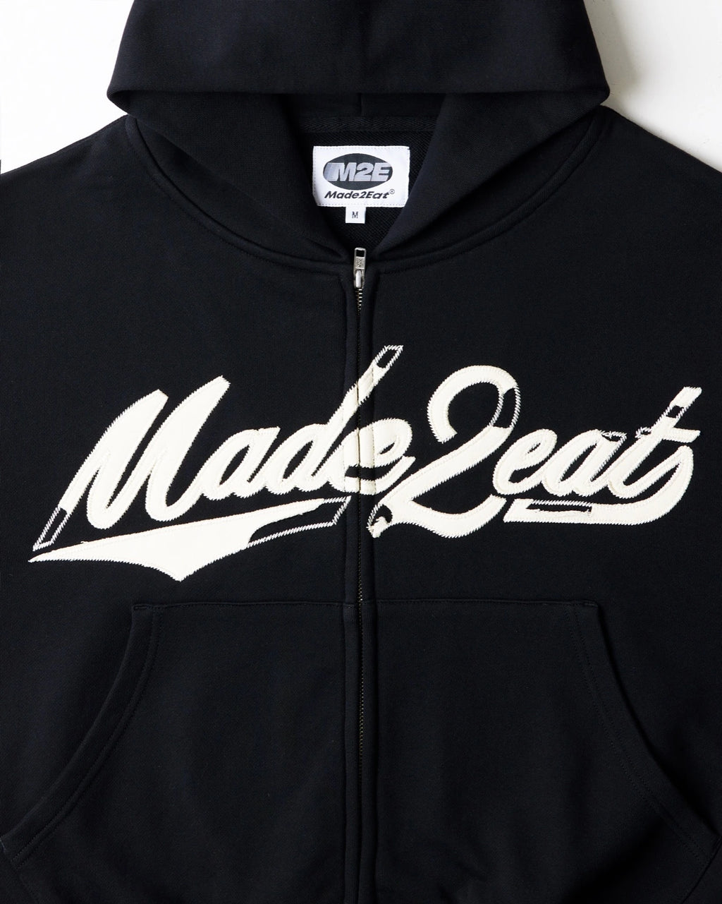 Black rope stitched hoodie with made2eat stitched across the chest. Made from 420 GSM French terry