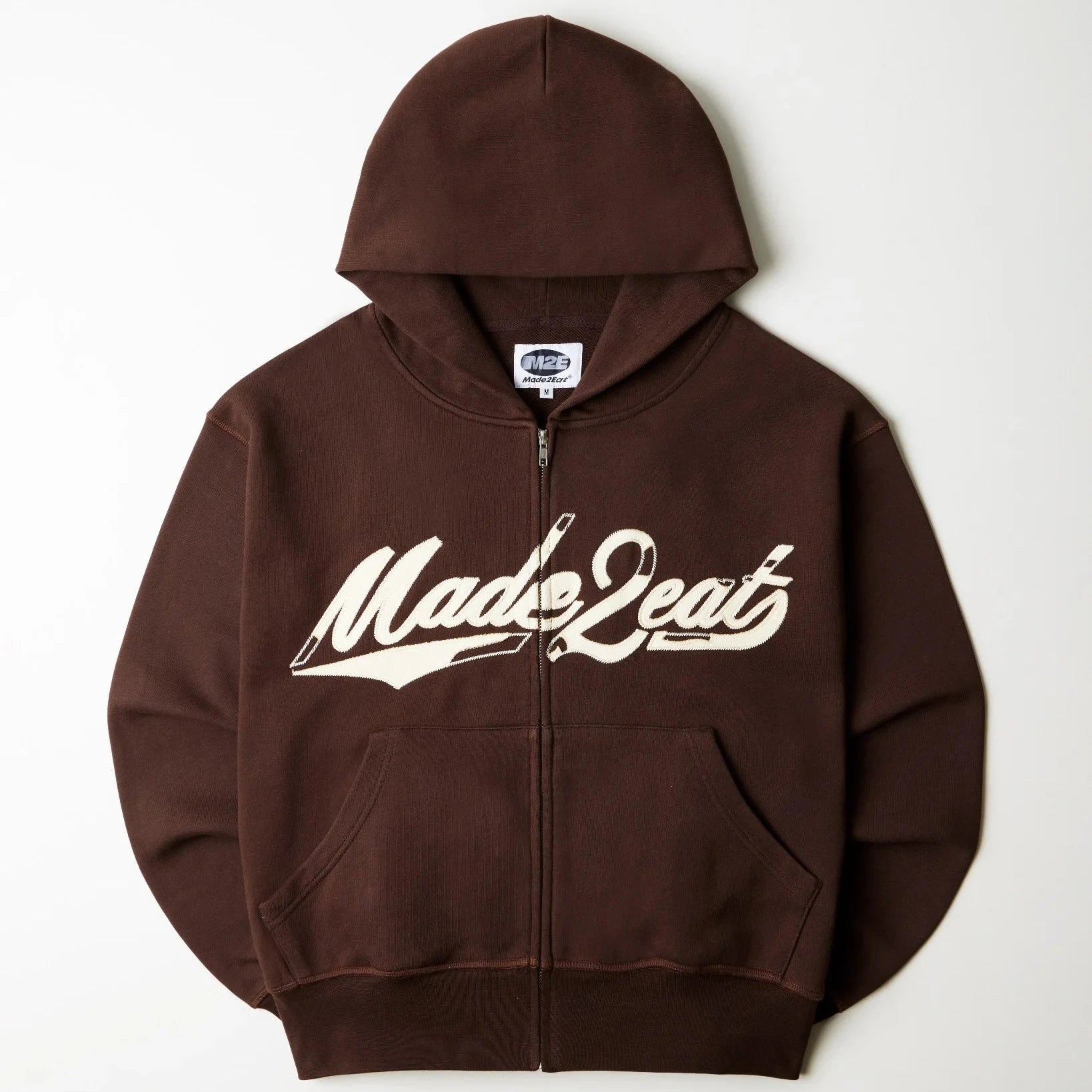 Brown rope stitched hoodie with made2eat stitched across the chest. Made from 420 GSM French terry