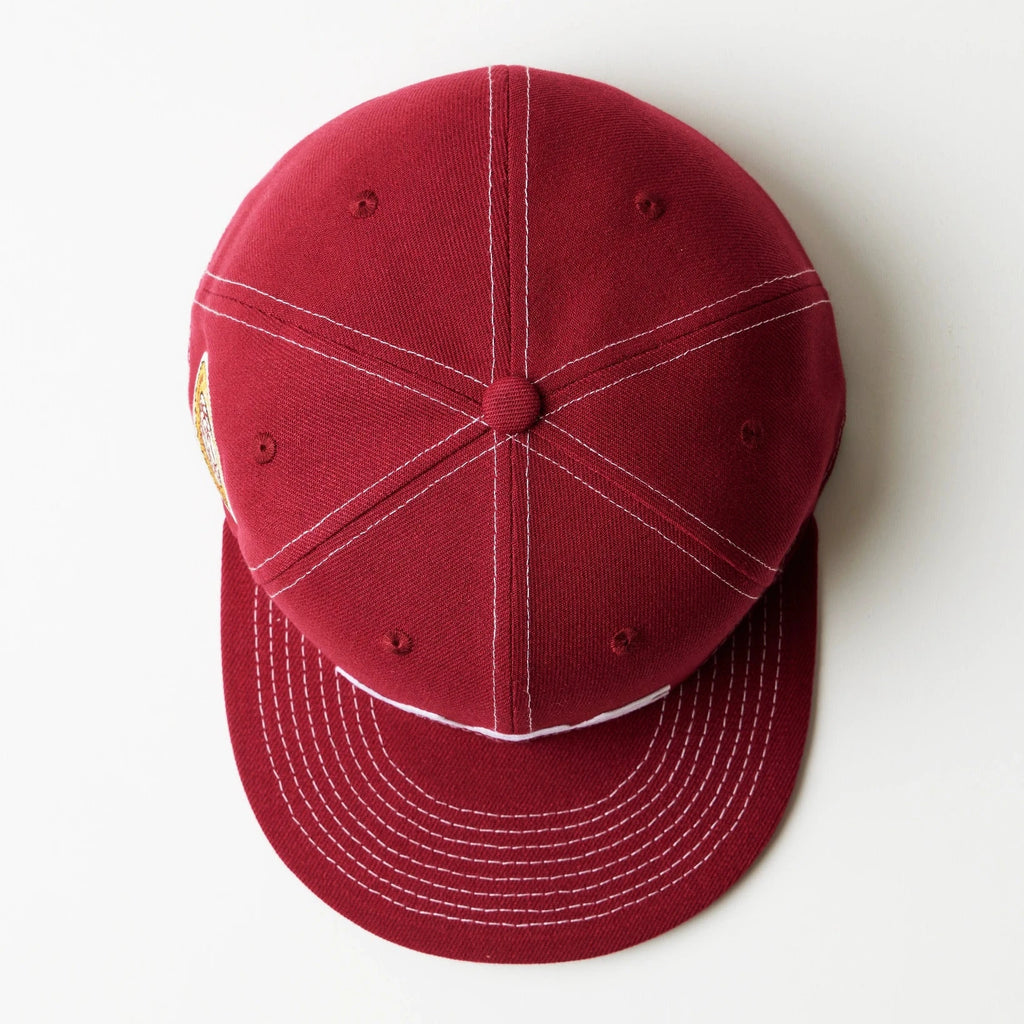 Red fitted cap on a white background