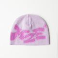 pink beanie product photo on a white background 
